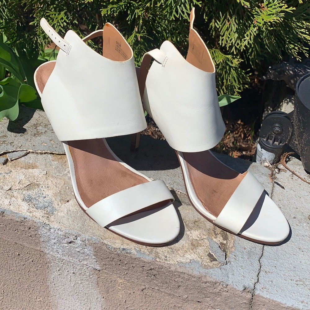 Women’s white sandal heels.